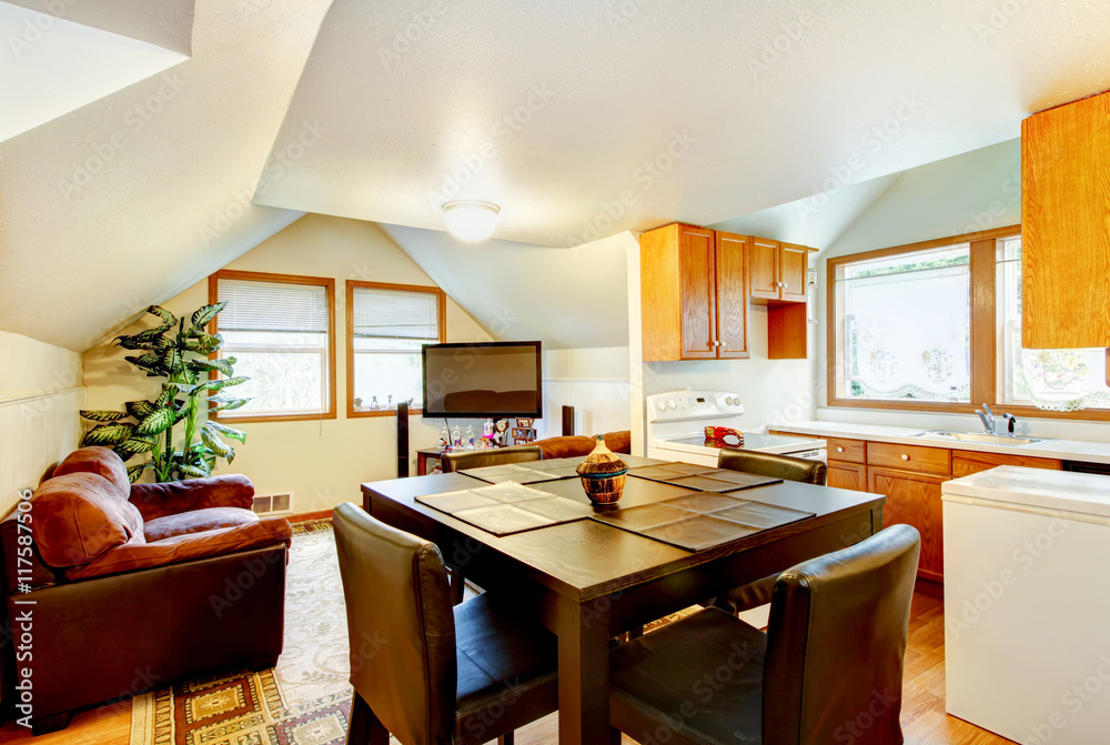 Fototapeta premium Dining and kitchen room interior with white vaulted ceiling.