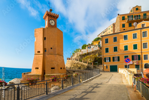 Main square and lighthouse architecture in Rio Marina, on the coast of Elba island - Italy