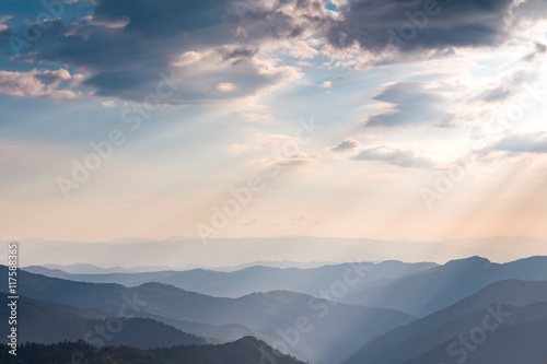 Sun rays in mountain © edeshko
