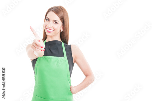Saleswoman doing refusal gesture with her index finger