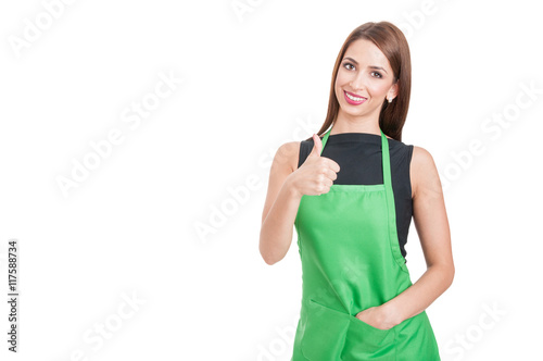 Trustworthy saleswoman doing like gesture