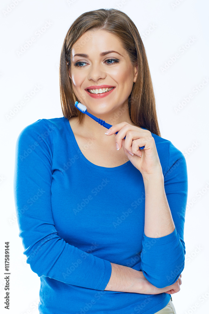 Portrait of young woman in kitchen. Portrait of young woman in kitchen.