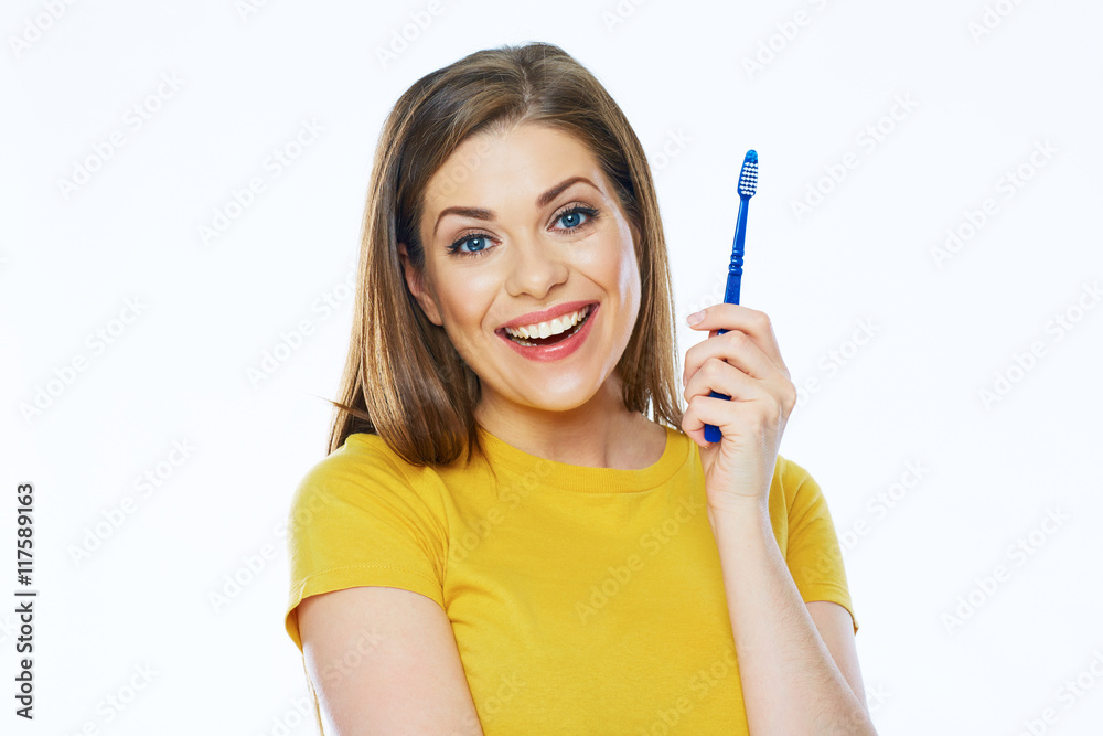 Smiling woman holding toothy brush. Isolated studio portrait. Smiling woman holding toothy brush. Isolated studio portrait.