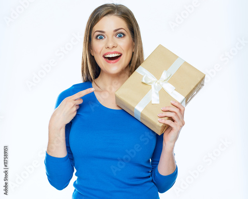 smiling beautiful woman holding gift box. Isolated