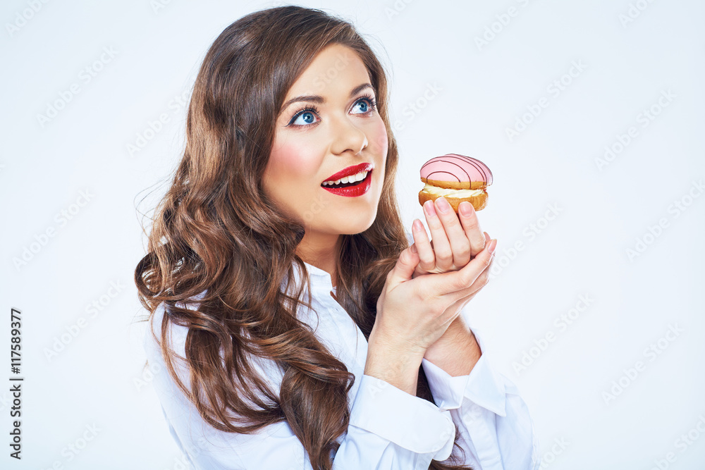 Smiling woman holding cake close up portrait.