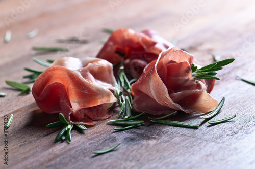 Fototapeta Naklejka Na Ścianę i Meble -  jamon with rosemary