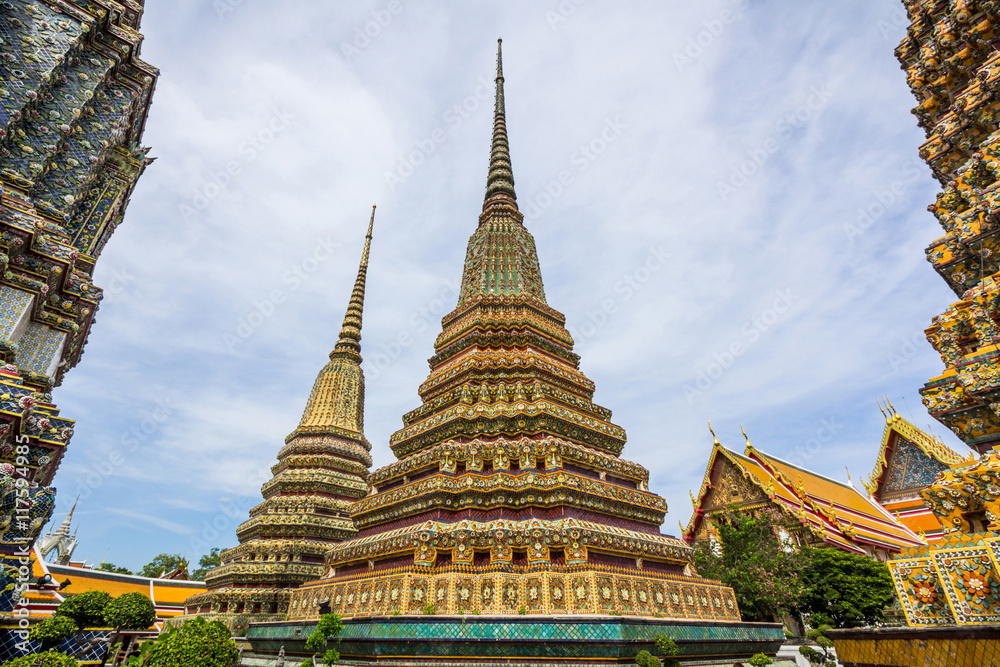 Stupas of Wat Po Buddhist temple complex in Bangkok, Thailand. Stupas of Wat Po Buddhist temple complex in Bangkok, Thailand.