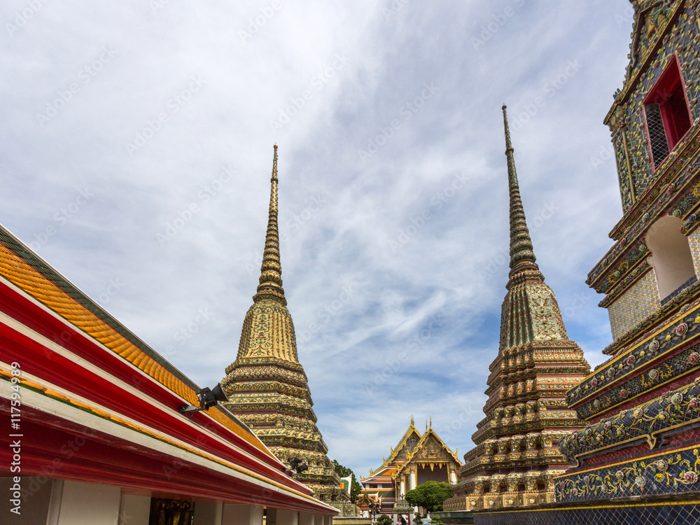 Stupas of Wat Po Buddhist temple complex in Bangkok, Thailand.