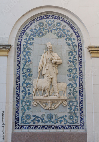 Bas-relief of the Soviet era in the building of the pavilion ENE photo