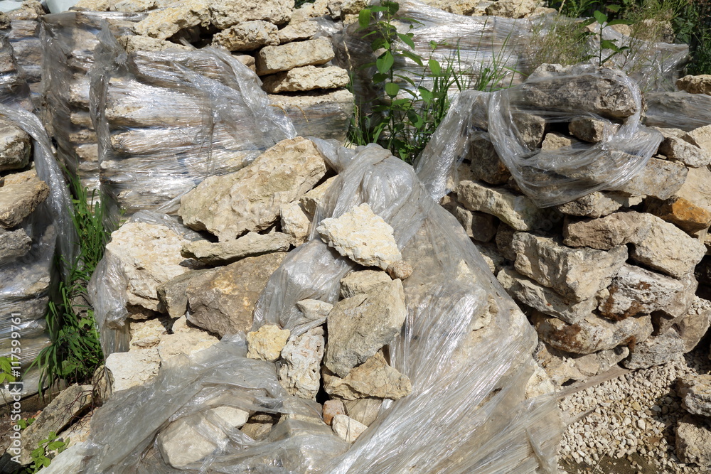 Large industrial stones for landscape design packed in cellophane
