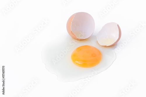 Broken egg on white background, food concept