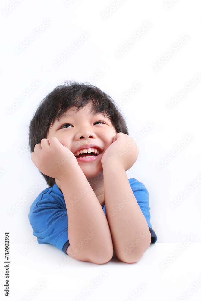 Portrait of little Asian boy in casual clothes looking up and thinking Portrait of little Asian boy in casual clothes looking up and thinking