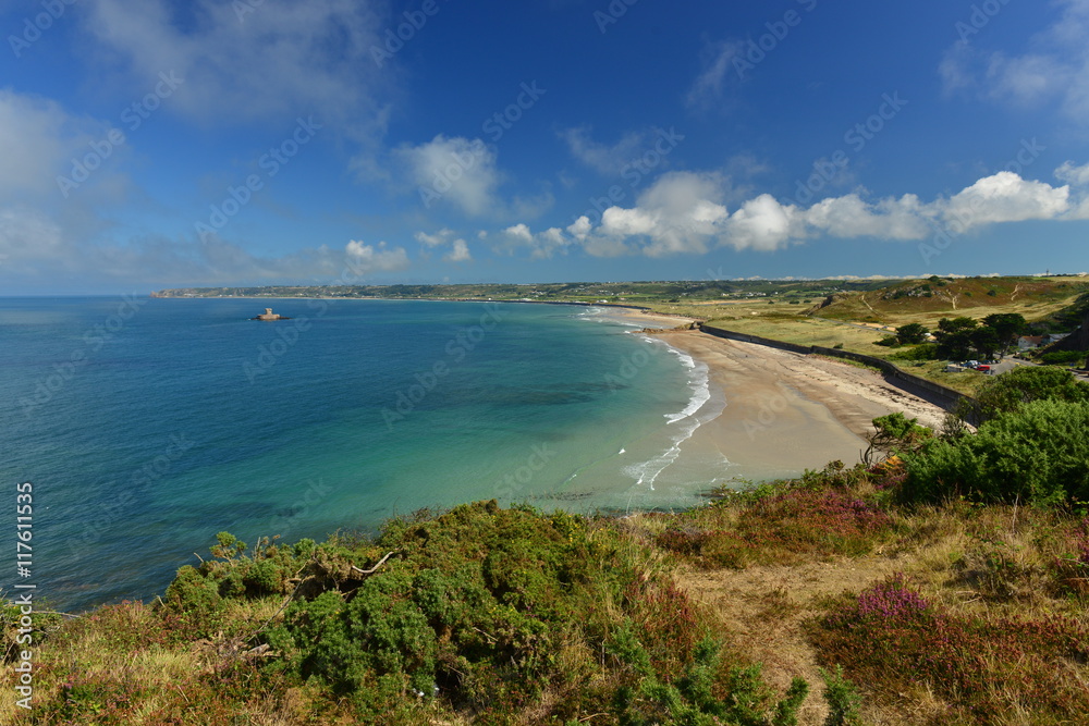 St.Ouen's Bay, Jersey, U.K.   Wide angle headland vista of a beach in the Summer.