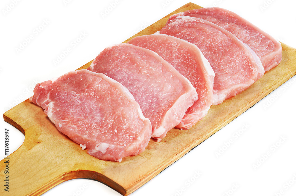 Five slices of meat on the cutting board Five slices of meat on the cutting board