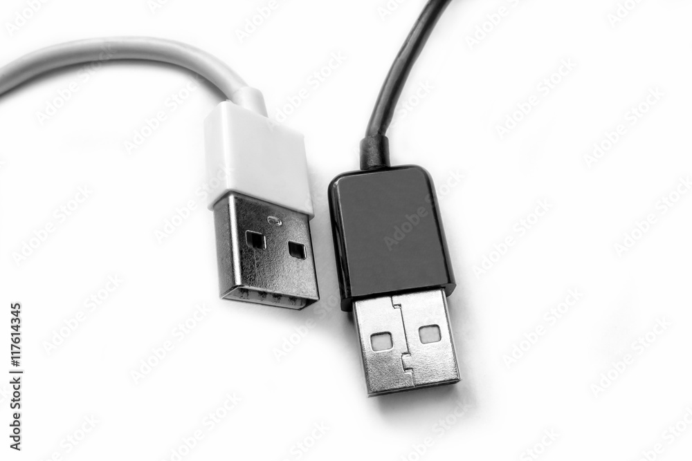 Black and white USB connectors. Computer peripheral connectors for connecting devices. Computer technology and equipment for the transmission of information. Black and white USB connectors. Computer peripheral connectors for connecting devices. Computer technology and equipment for the transmission of information.