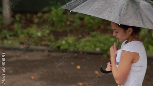 woman with umbrella in the rain photo