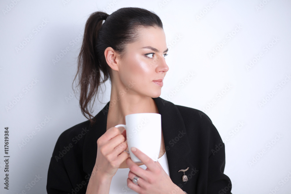 Portrait of young woman with cup tea or coffee Portrait of young woman with cup tea or coffee