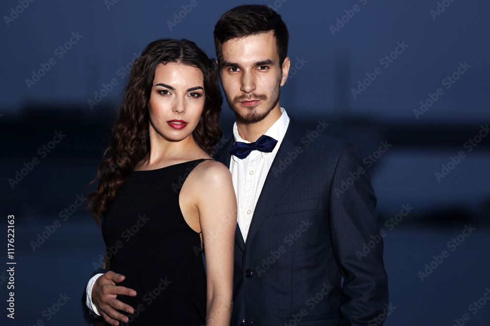 Elegant couple, evening outdoor Elegant couple, evening outdoor