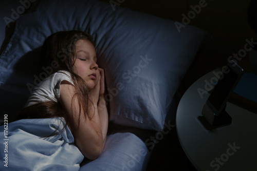 Photography Cute sleeping girl in bed