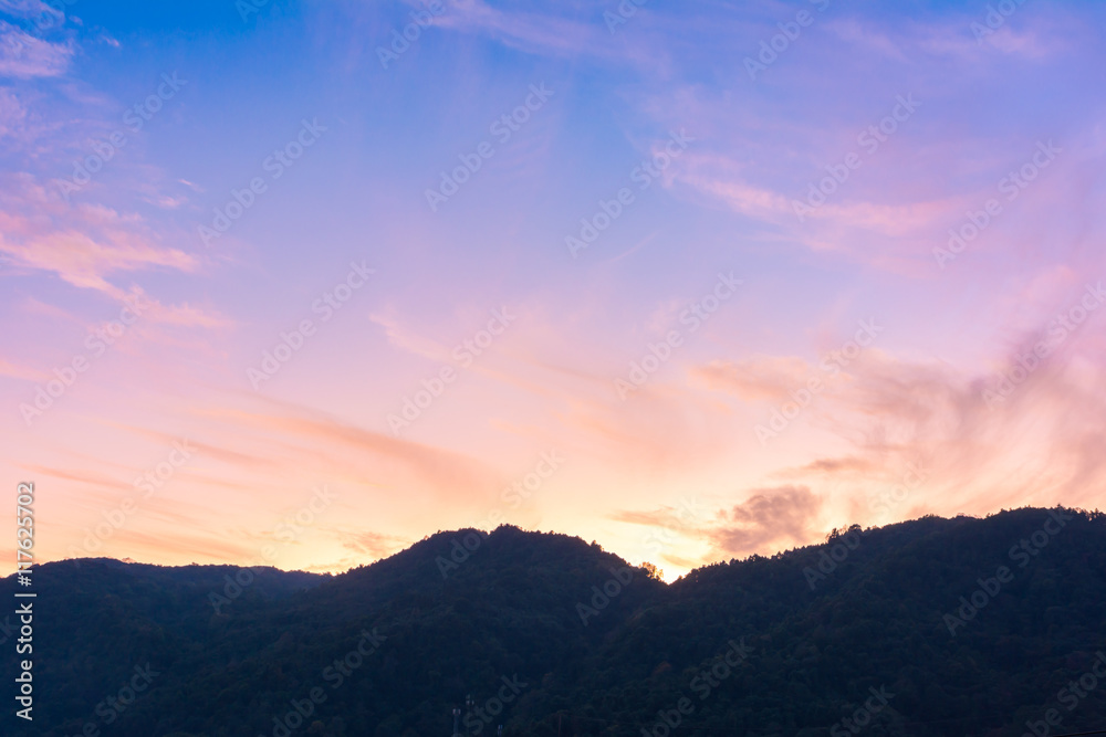 Sunset and mountain foreground