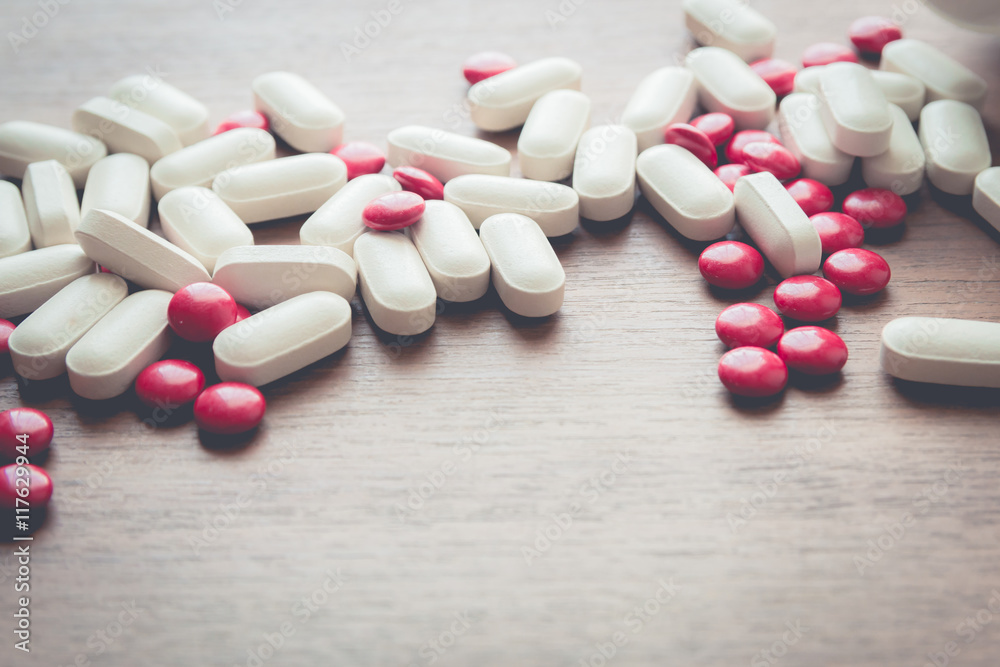 medicine pill on wood table medicine pill on wood table