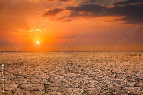 Cracked earth soil sunset landscape