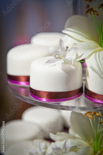 Mini Wedding Cakes and Flowers Detail.