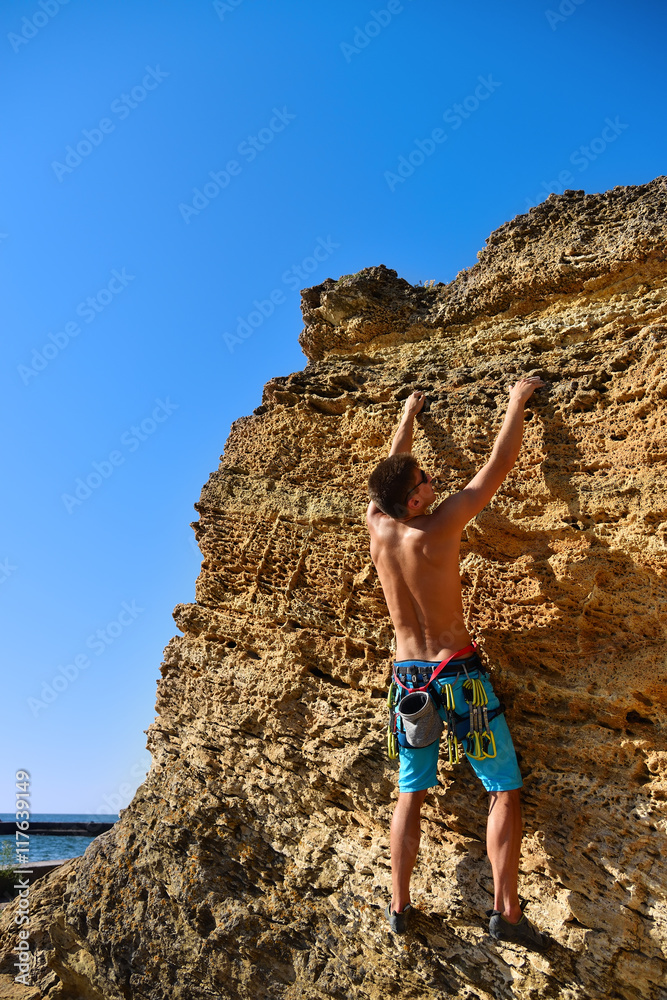 extreme man climbing up extreme man climbing up