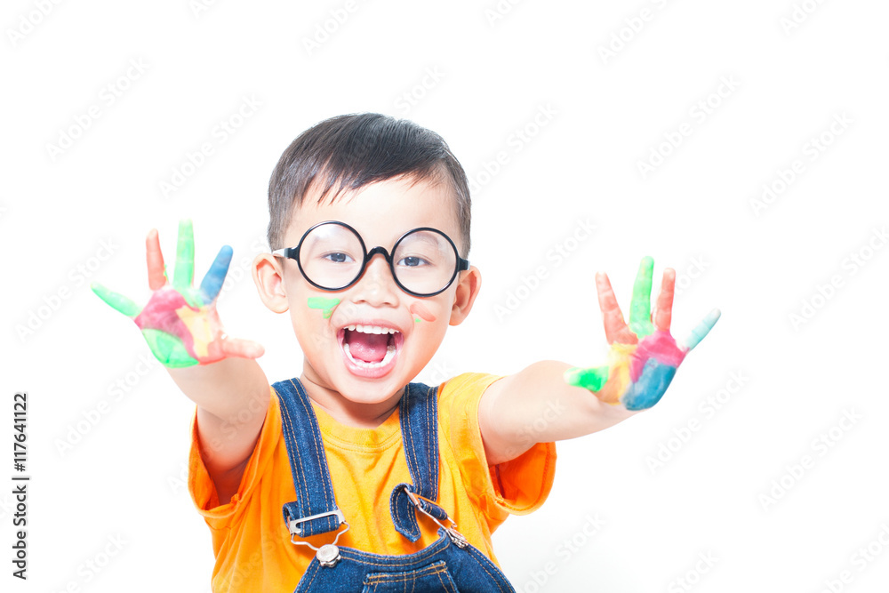 little boy with hands painted in colorful paints ready for hand prints little boy with hands painted in colorful paints ready for hand prints