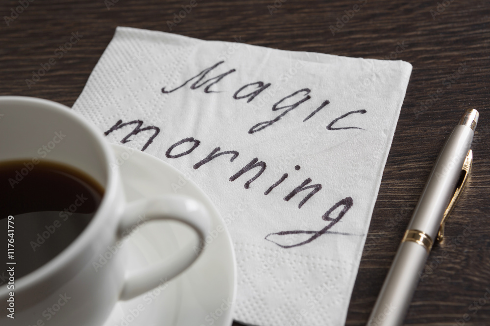 Coffee cup and napkin with message Coffee cup and napkin with message