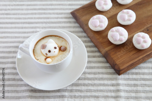 Coffee in white mug with melted cat shaped marshmallow & cat paw shaped marshmallows