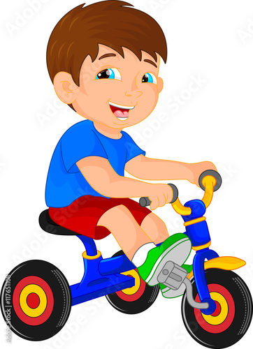 funny little child on tricycle