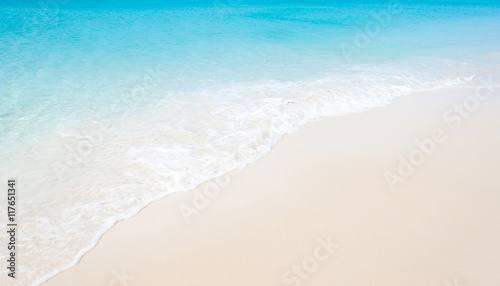 Fototapeta Naklejka Na Ścianę i Meble -  Tropical beach with coral white sand and calm wave