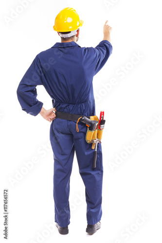 Image of a young worker pointing, isolated on white background