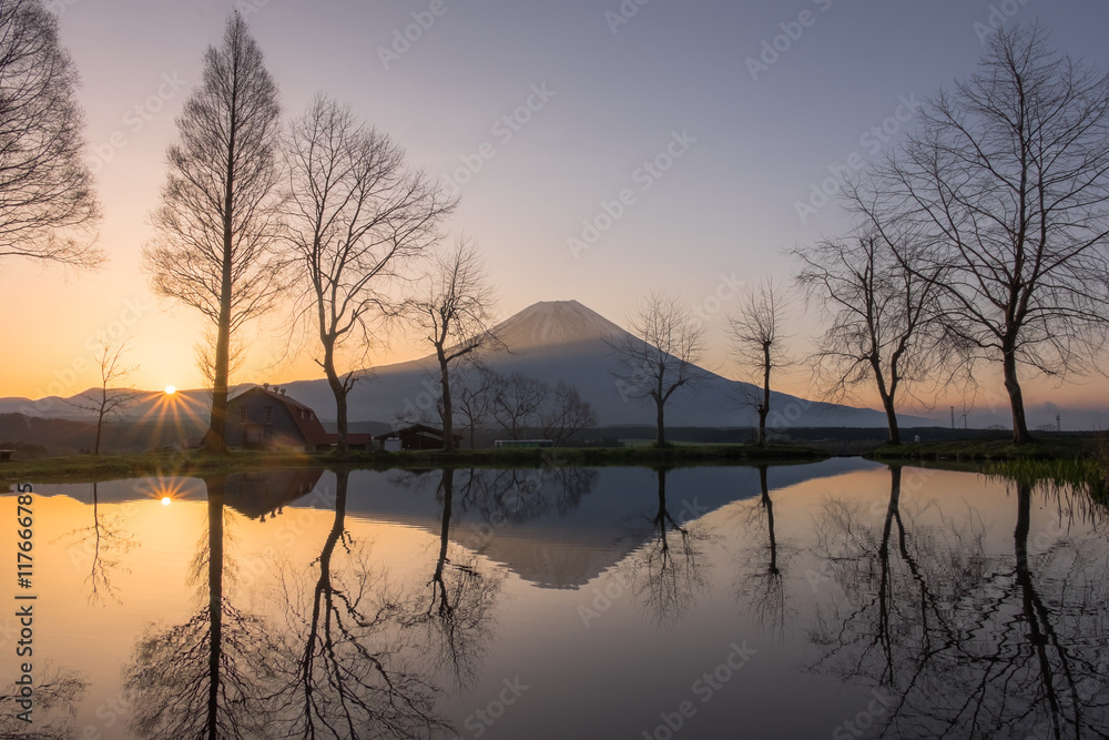 Mount Fuji during sunrise with small lake at Fumoto