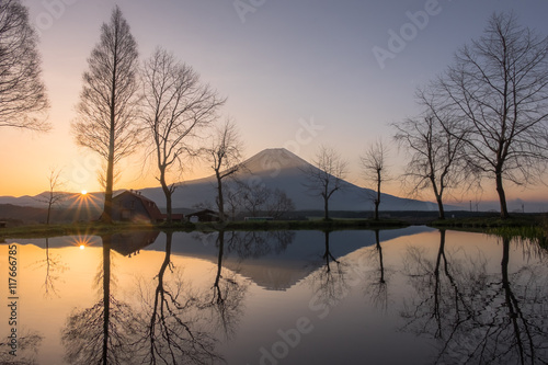 Mount Fuji during sunrise with small lake at Fumoto