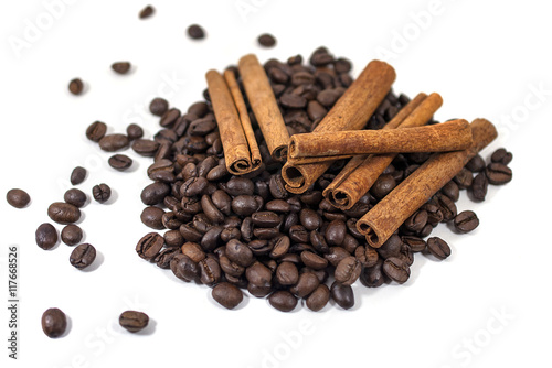 Coffee beans and Cinnamon on the white background - isolated