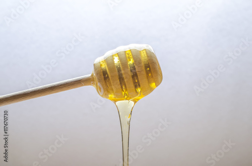 fresh honey with a stick