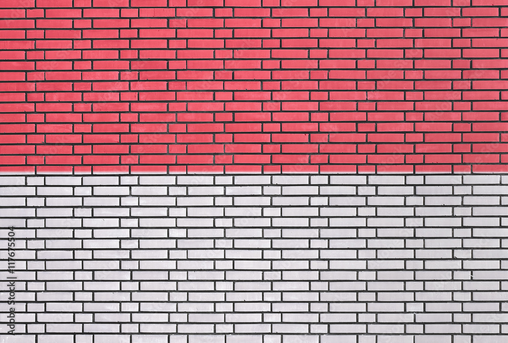 Indonesian flag painted on brick wall Indonesian flag painted on brick wall
