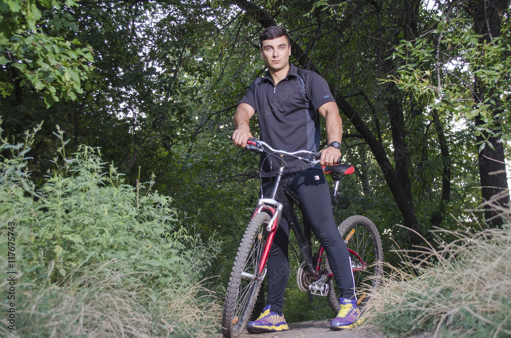 Fototapeta premium the guy rides a bike