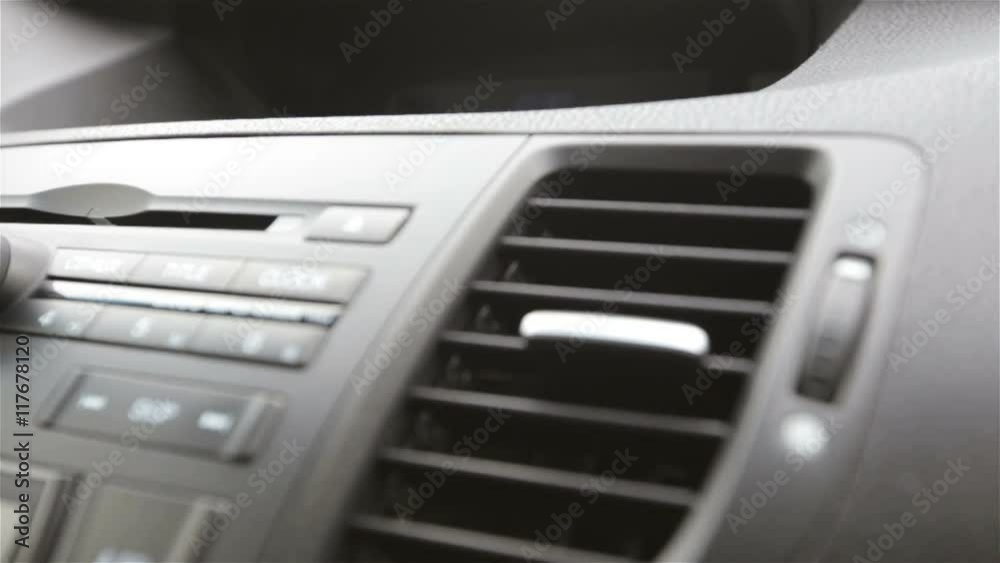 Buttons comfort in cars on the panel in slow motion Buttons comfort in cars on the panel in slow motion