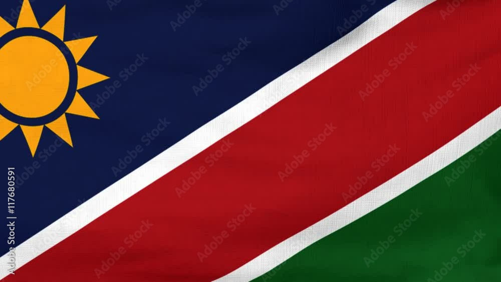 National flag of Namibia flying and waving on the wind. Sate symbol of Namibian nation and government. Computer generated animation.