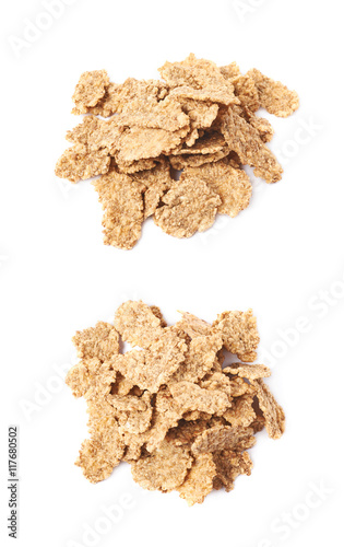 Pile of wholegrain cereal flakes isolated