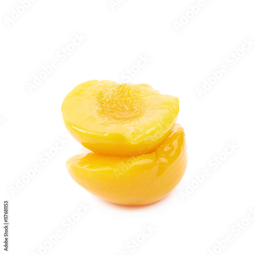 Canned peach half isolated