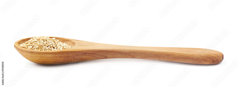 Spoon filled with quinoa seeds isolated Spoon filled with quinoa seeds isolated