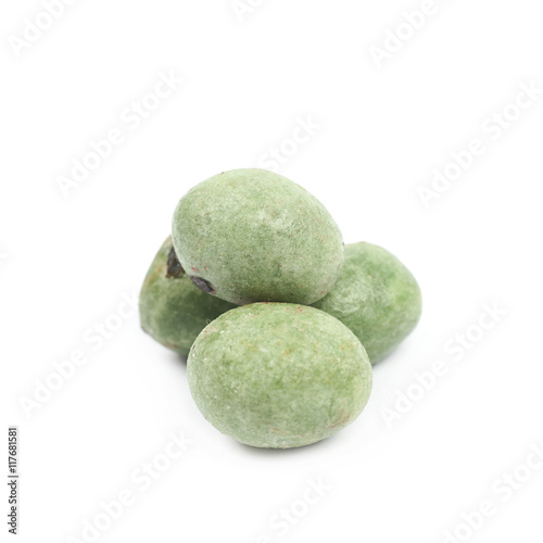 Green wasabi coated peanuts isolated