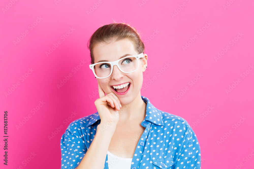 Young woman in a thoughtful pose Young woman in a thoughtful pose