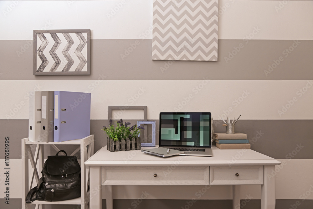 Fototapeta premium Stylish workplace with laptop at home