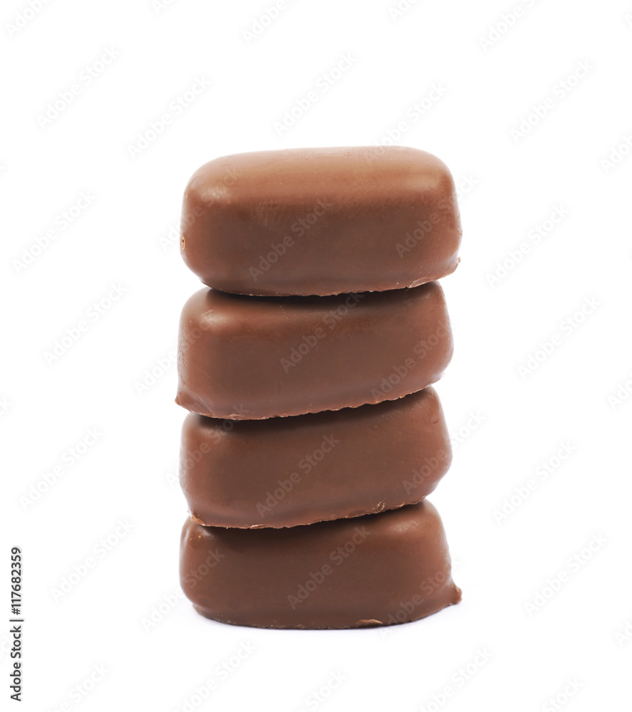 Chocolate coated toffee candy isolated