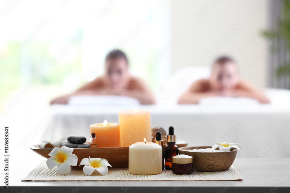 Spa composition and girls on blurred background Spa composition and girls on blurred background
